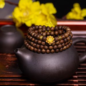 Blossom Philippines agarwood beaded bracelet with 24k gold charm