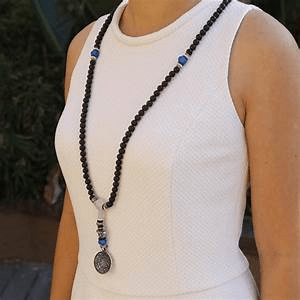 sandalwood mala beads on necklace