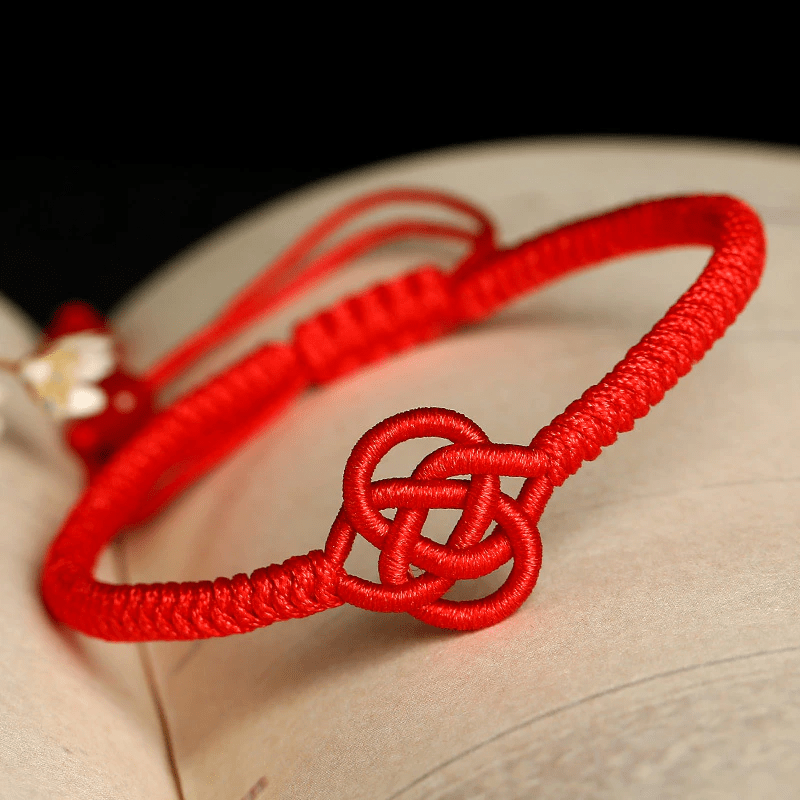 Red rope bracelet on sale meaning