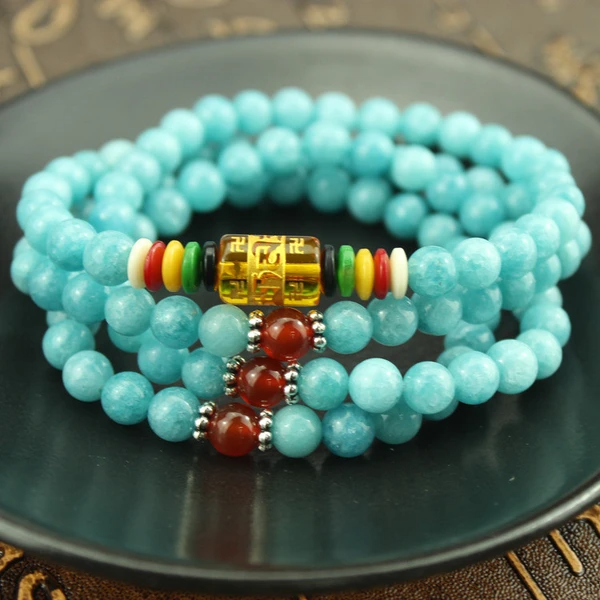 https://tmhagarwood.com/wp-content/uploads/2021/11/blue-mala-beads.png