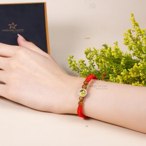 Red string bracelet with agarmoon