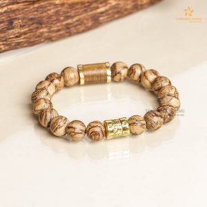 Tibet agarwood beaded bracelet with golden charm - Indonesia